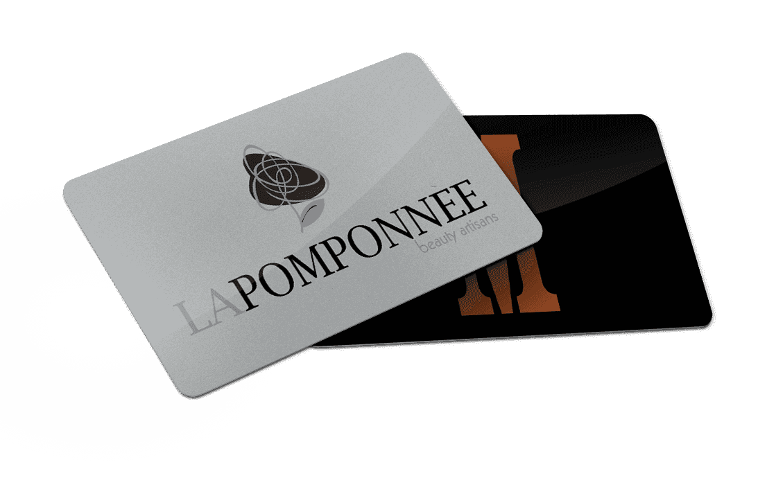Two overlapping business cards, one grey with "LaPomponnee" text, the other black with an orange "M".